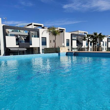 Oasis Beach Apartments อาลิกันเต ภายนอก รูปภาพ