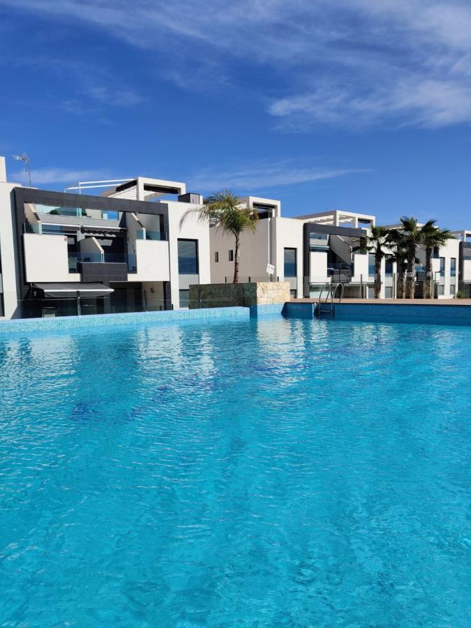Oasis Beach Apartments อาลิกันเต ภายนอก รูปภาพ